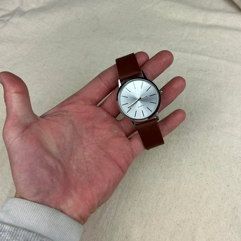 Minimalistic essential vintage style watch stainless steel brown and silver